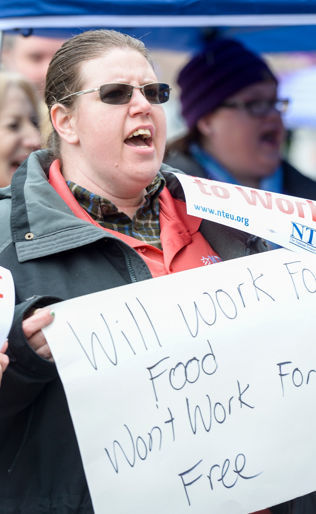 Leah Hogsten  |  The Salt Lake Tribune  Internal Revenue Service employee Kristal Miller rallies with fellow IRS employees in protest of the ongoing partial federal shutdown outside the Ã