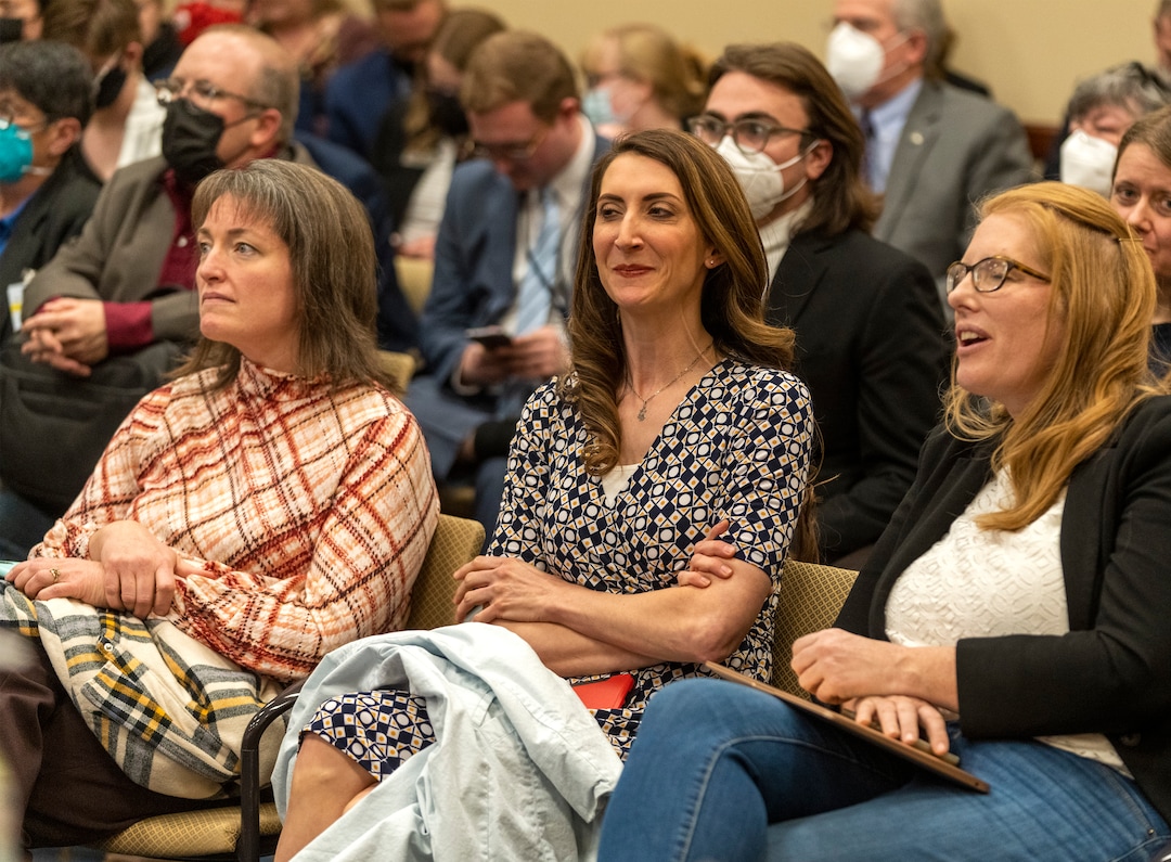 (Rick Egan | The Salt Lake Tribune) Nichole Mason, center, president of Utah Parents United reacts as a speaker speaks out against SB114, during a crowded Education Committee hearing on Thursday, Jan. 27, 2022.