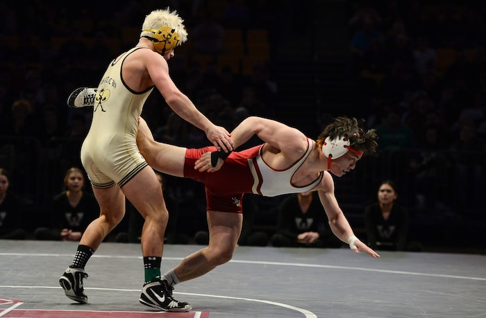 (Francisco Kjolseth  |  The Salt Lake Tribune)  Zak Kohler of Wasatch holds on to Shion Abe of Viewmont in the Class 5A 138 weight class state wrestling championship match at the Utah Valley University UCCU Center on Thursday, Feb. 8, 2018.