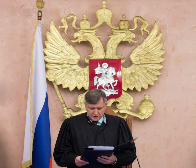 (AP Photo/Ivan Sekretarev) Russia's Supreme Court Judge Yuri Ivanenko reads the decision in a courtroom in Moscow, Russia, on Thursday, April 20, 2017. Russia's Supreme Court has banned the Jehovah's Witnesses from operating in the country, accepting a request from the justice ministry that the religious organization be considered an extremist group, ordering closure of the group's Russia headquarters and its 395 local chapters, as well as the seizure of its property.