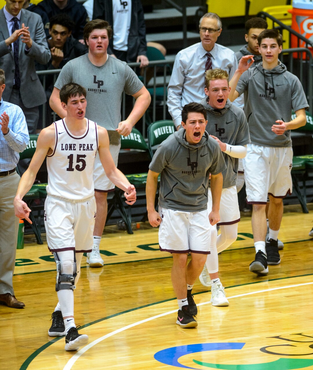 (Steve Griffin  |  The Salt Lake Tribune) Lone Peak's celebrates a lthree-pointer during 6A basketball playoff game against Herriman at the Utah Valley UniversityÕs UCCU Center in Provo Tuesday Feb. 27, 2018.