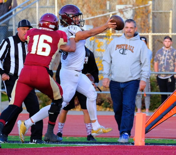 (Leah Hogsten  |  The Salt Lake Tribune) Jordan's  quarterback Crew Wakeley's touchdown.  Jordan High School boys' football team leads Viewmont High School 14-10 at the half during their class 5A football playoff opener, Friday, October 27, 2017 in Bountiful
