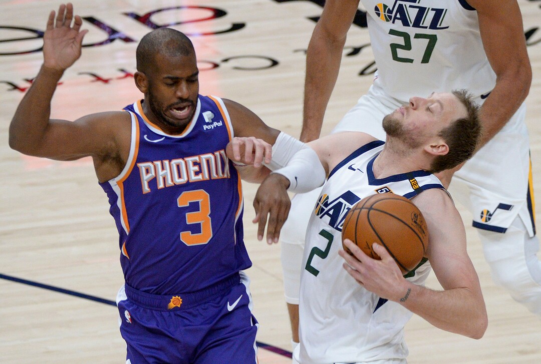 (Leah Hogsten  |  The Salt Lake Tribune) Utah Jazz forward Joe Ingles (2) draws the foul on Phoenix Suns guard Chris Paul (3) as the Jazz crack open their 2020-21 preseason with their second game against the Phoenix Suns, Dec. 14, 2020.