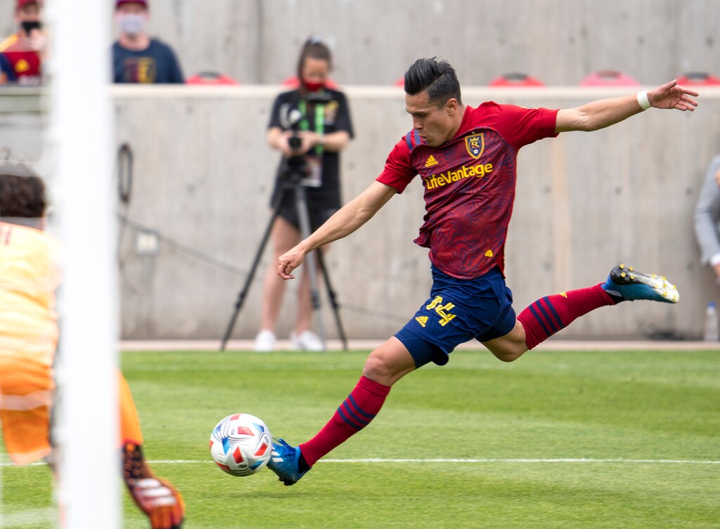 (Rick Egan | The Salt Lake Tribune)  Salt Lake forward Rubio Rubin (14) kicks the ball for Real Salt Lake, in MLS action between Real Salt Lake and Sporting Kansas City at Rio Tinto Stadium, on Saturday, May 1, 2021.