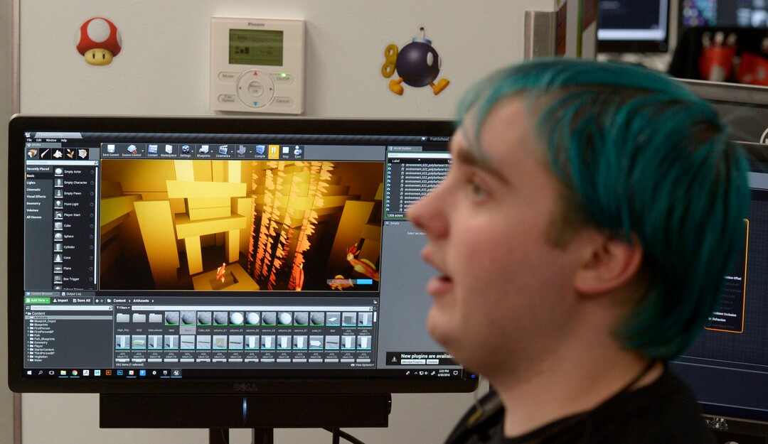 (Steve Griffin  |  The Salt Lake Tribune) Patrick Benson-Kingsland, a student in the University of Utah's Entertainment Arts & Engineering department (EAE), runs through the demonstration of his game during the department's  two-day event celebrating its 10th anniversary at the University of Utah in Salt Lake City Monday April 30, 2018. Tuesday is EAE Launch Day, where  students show off their game designs and finished games.