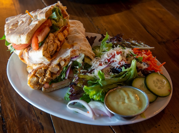 (Rick Egan  |  The Salt Lake Tribune)     Buffalo Chicken Sandwich with House Salad, at Slackwater Pizzeria in Sandy, Thursday, March 5, 2020.