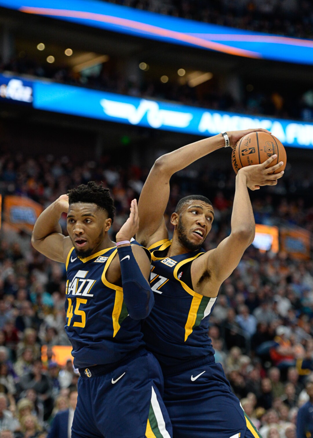 (Francisco Kjolseth  |  The Salt Lake Tribune)  Utah Jazz guard Donovan Mitchell (45) and Utah Jazz center Tony Bradley (13) reach in for the rebound as the Utah Jazz host the New Orleans Pelicans in their NBA basketball game at Vivint Smart Home Arena in Salt Lake City on Sat. Nov. 23, 2019.