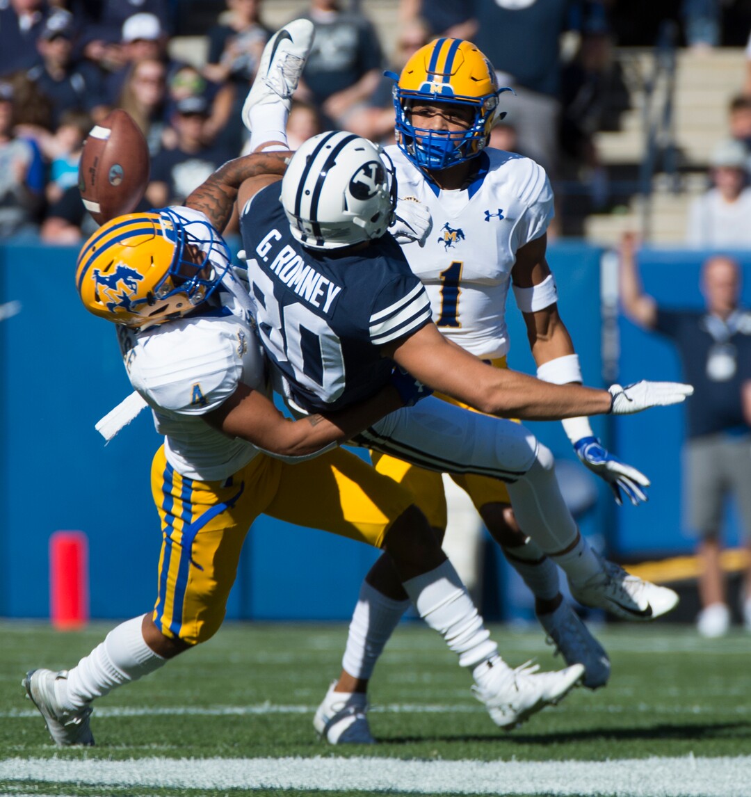 (Rick Egan  |  The Salt Lake Tribune)     McNeese State Cowboys defensive back Colby Burton (4) deflects a pass intended for Brigham Young Cougars wide receiver Gunner Romney (80), in football action between Brigham Young Cougars and McNeese State Cowboys, at Lavell Edwards Stadium, Saturday, Sept. 22, 2018.