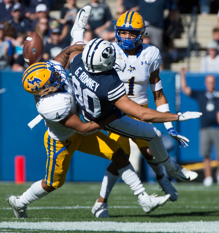 (Rick Egan  |  The Salt Lake Tribune)     McNeese State Cowboys defensive back Colby Burton (4) deflects a pass intended for Brigham Young Cougars wide receiver Gunner Romney (80), in football action between Brigham Young Cougars and McNeese State Cowboys, at Lavell Edwards Stadium, Saturday, Sept. 22, 2018.



