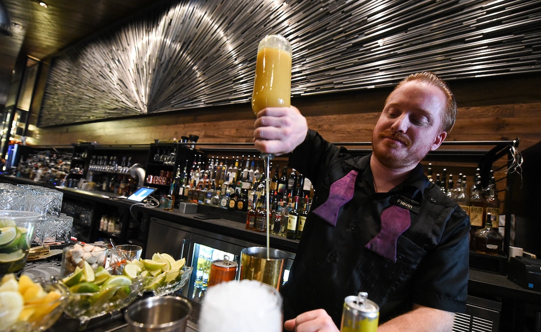 (Francisco Kjolseth  |  The Salt Lake Tribune)  Daniel Flavin mixes drinks at the new London Belle Supper Club, a new Salt Lake City bar named after Belle London, a famous Utah madam, at 321 S. Main.