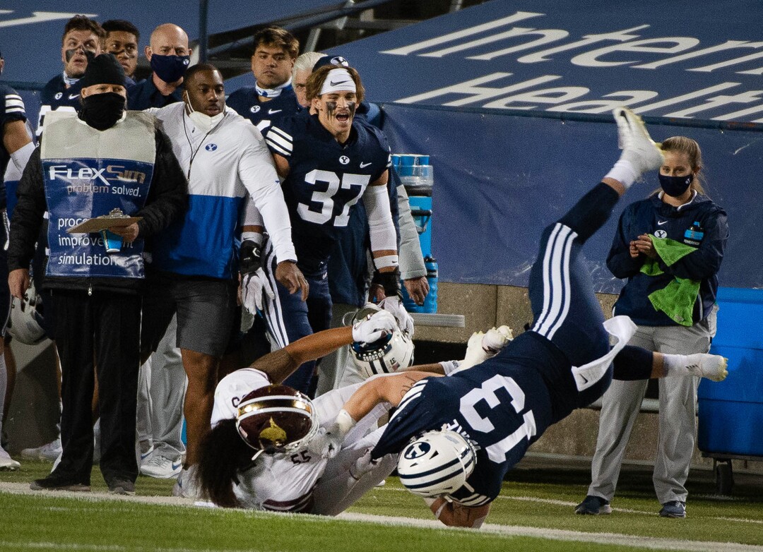 (Francisco Kjolseth  |  The Salt Lake Tribune) Texas State Bobcats linebacker Sione Tupou (55) takes out Brigham Young Cougars tight end Masen Wake (13) as BYU takes on Texas State during an NCAA college football game at LavVell Edwards Stadium, Saturday, oct. 24, 2020, in Provo, Utah.