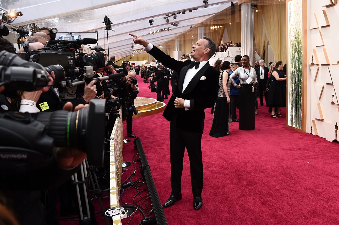 (Jordan Strauss | Invision/AP)  Tom Hanks arrives at the Oscars on Sunday, Feb. 9, 2020, at the Dolby Theatre in Los Angeles.