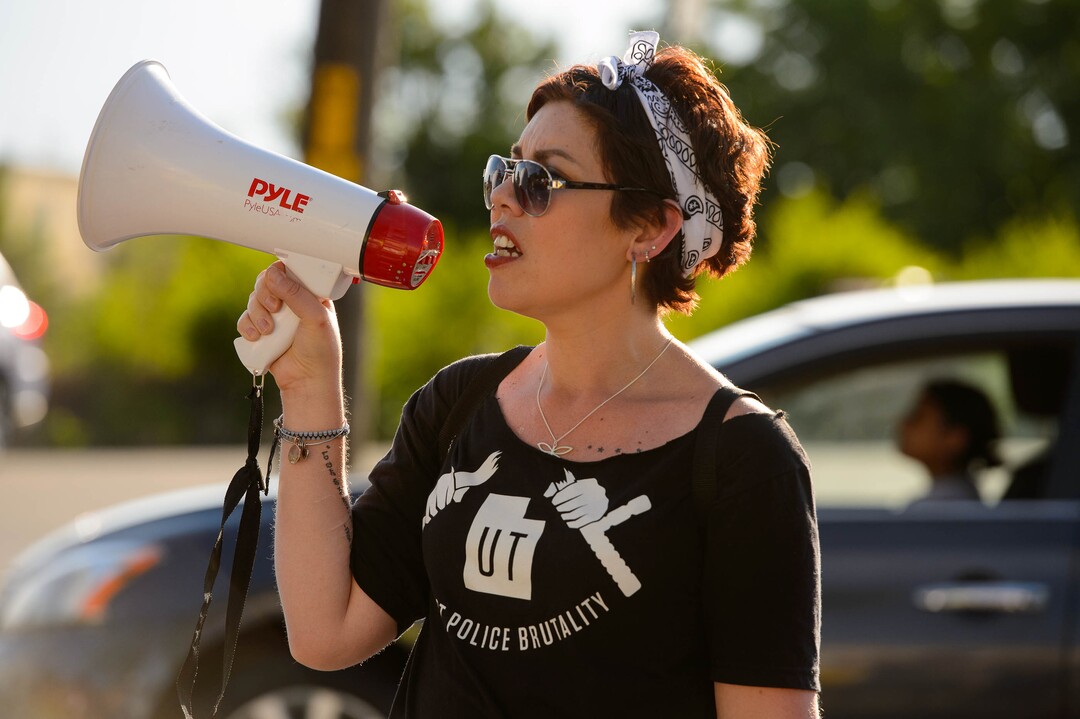 (Trent Nelson  |  The Salt Lake Tribune)Deb Blake speaks at a protest organized by Black Lives Matter and other groups at the Woods Cross Police Department on Friday June 14, 2019. The rally was to show support for DJ Hrubes, a 10-year-old black child who was held at gunpoint by a police officer last week while playing in his grandmother's front yard.