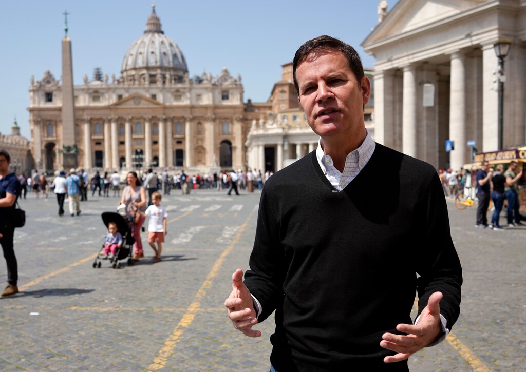 (AP Photo/Andrew Medichini) Juan Carlos Cruz, backdropped by St.Peter's Basilica, talks during an interview with The Associated Press in Rome, Tuesday, April 24, 2018. Cruz, who is the key whistleblower in Chile's clerical sex abuse scandal, has arrived in Rome for his audience with Pope Francis and says he will urge Francis to get rid of the "toxic" bishops and cardinals who have defamed and discredited him and other abuse survivors around the world.
