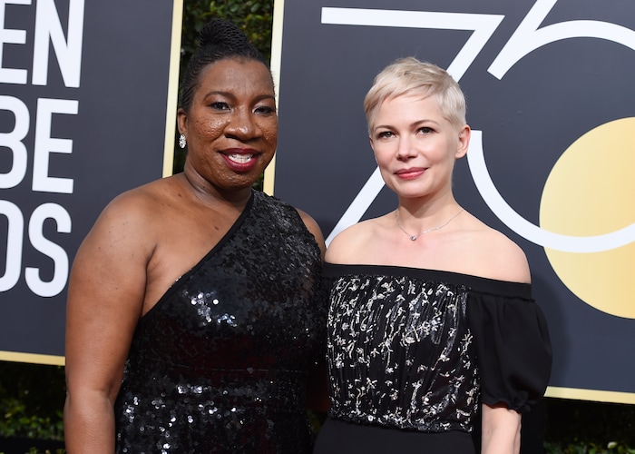 Tarana Burke, left, and Michelle Williams arrive at the 75th annual Golden Globe Awards at the Beverly Hilton Hotel on Sunday, Jan. 7, 2018, in Beverly Hills, Calif. (Photo by Jordan Strauss/Invision/AP)
