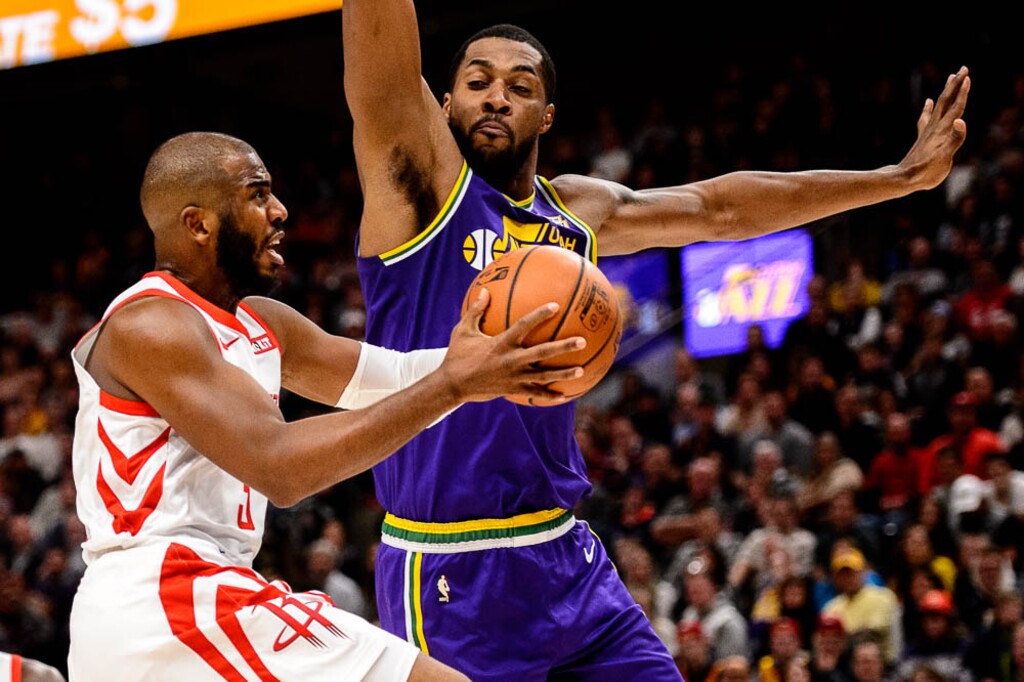 (Trent Nelson | The Salt Lake Tribune)  Houston Rockets guard Chris Paul (3) and Utah Jazz forward Derrick Favors (15). The Utah Jazz host the Houston Rockets, NBA basketball in Salt Lake City on Thursday Dec. 6, 2018.