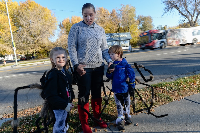 (Francisco Kjolseth  |  The Salt Lake Tribune)  Anna Simmon describes the harrowing Halloween night two years ago when her twin children, Eleanor, left, and Frederick, along with her husband and niece were struck by a truck turning left across traffic at 2100 South and 400 East in Salt Lake. Revisiting the scene she witnessed while following close behind, Simmon relayed her story in hopes of keeping trick-or-treaters of all ages safe this year. 