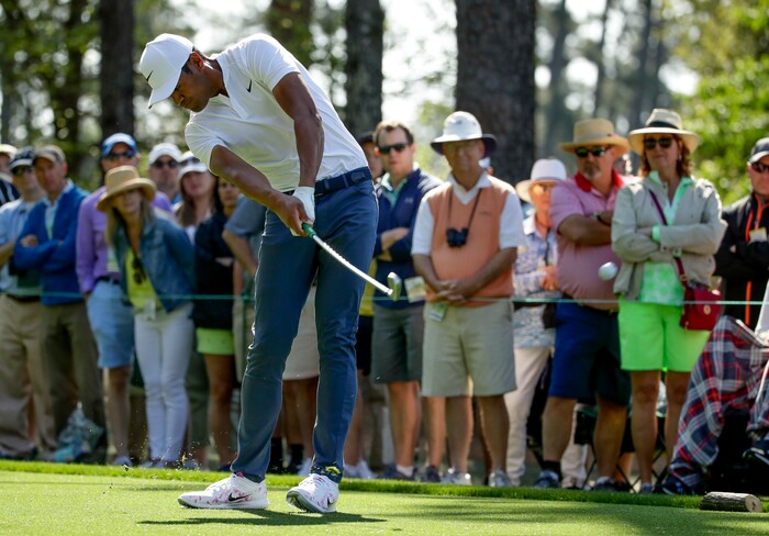 Tony Finau hits a shot on the fourth hole during the second round at the Masters golf tournament Friday, April 6, 2018, in Augusta, Ga. (AP Photo/Chris Carlson)