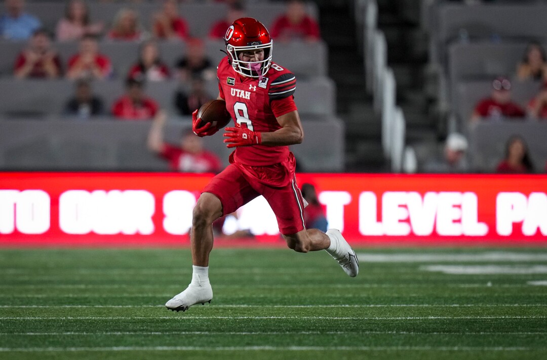 (Bethany Baker  |  The Salt Lake Tribune) Utah Utes wide receiver Mana Carvalho (8) runs the ball during the first half of the game between the Utah Utes and the Idaho Vandals at Rice-Eccles Stadium in Salt Lake City on Thursday, Sept. 3, 2026.
