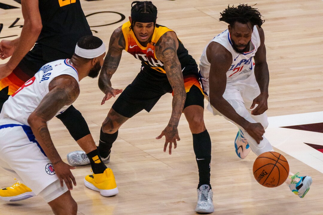 (Trent Nelson  |  The Salt Lake Tribune) LA Clippers guard Patrick Beverley (21) steals the ball from Utah Jazz guard Jordan Clarkson (00) as the Utah Jazz host the Los Angeles Clippers in a Game 5 matchup, NBA basketball in Salt Lake City on Wednesday, June 16, 2021.