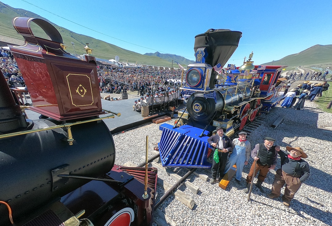 (Francisco Kjolseth  |  The Salt Lake Tribune)  People gather for photographs next to Jupiter and No. 119, on Friday May 10, 2019, in celebration of the 150th anniversary of the completion of the transcontinental railroad at Promontory Summit where the two rails met back on May 10, 1869.