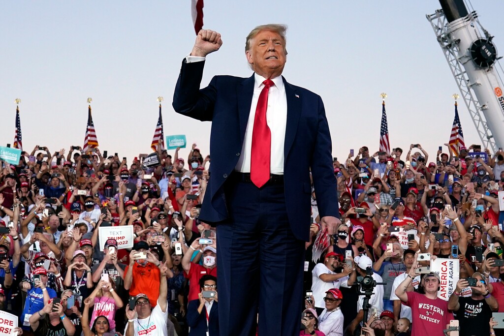 (Evan Vucci | AP file photo) President Donald Trump arrives for a campaign rally at Orlando Sanford International Airport, Monday, Oct. 12, 2020, in Sanford, Fla.