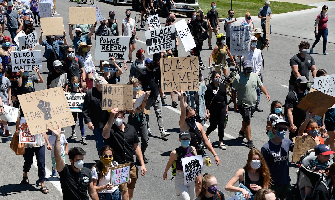 (Francisco Kjolseth  |  The Salt Lake Tribune) Demonstrators march the streets of downtown Salt Lake City for a protest as part of a series of Juneteenth celebrations on Friday, June 19, 2020.