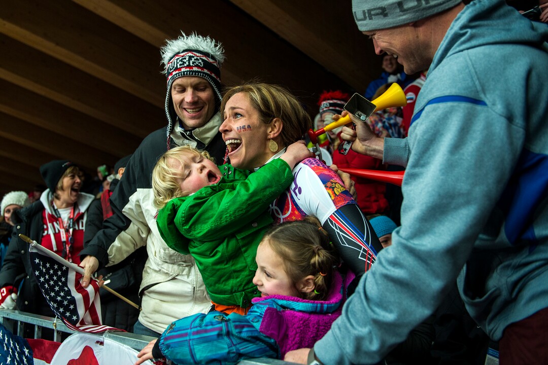 (Chris Detrick | Tribune file photo) Noelle Pikus-Pace celebrates with her family; son Traycen, 2, daughter Lacee, 6, husband Janson, right, and her brother Jared Pikus, left, after winning the silver medal in the women's skeleton competition at Sanki Sliding Center during the 2014 Sochi Olympics, Friday, Feb. 14, 2014. Pikus-Pace finished with a time of 3:53.86.