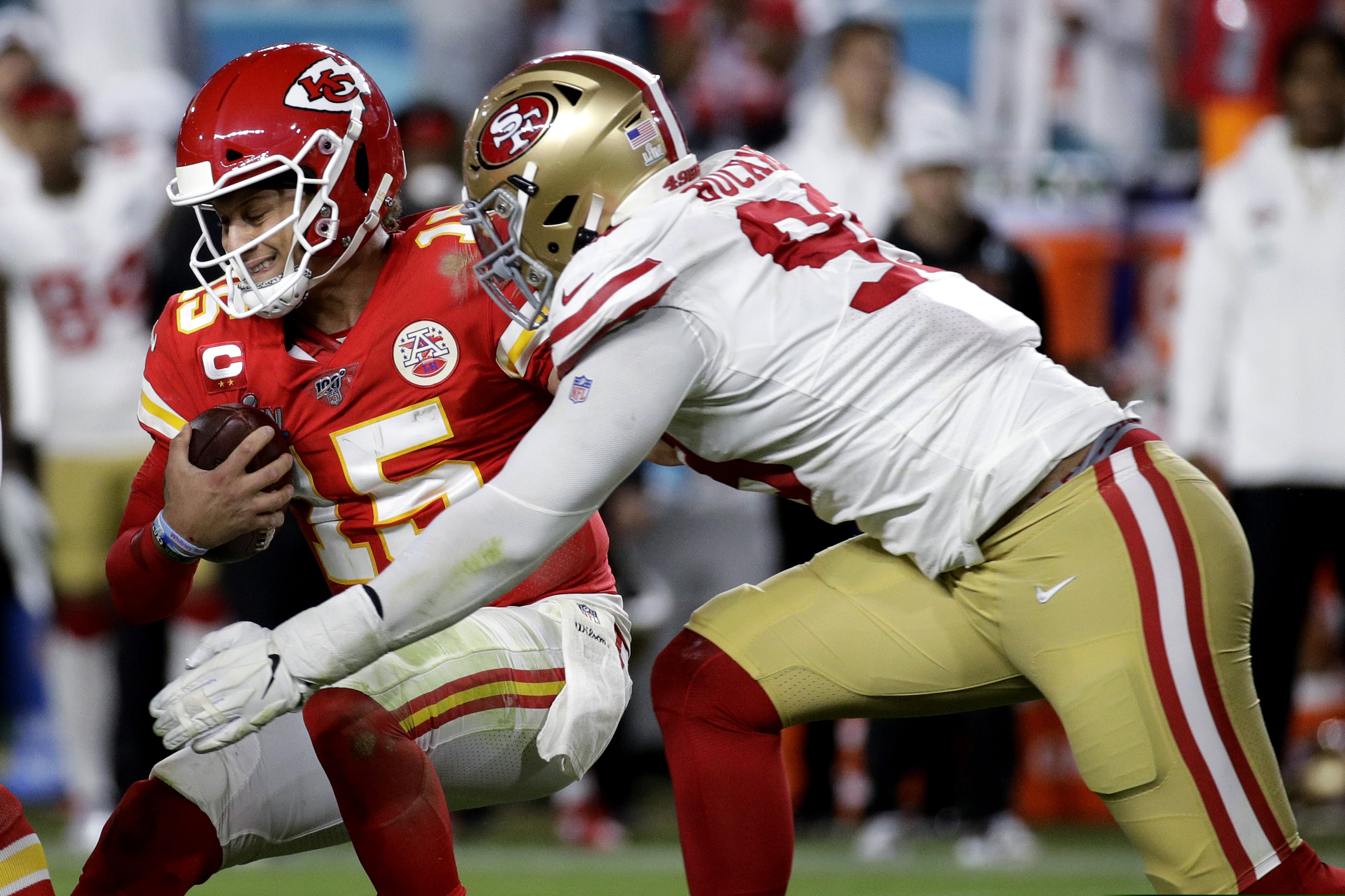 Kansas City Chiefs quarterback Patrick Mahomes (15) is sacked by San Francisco 49ers' DeForest Buckner during the second half of the NFL Super Bowl 54 football game Sunday, Feb. 2, 2020, in Miami Gardens, Fla. (AP Photo/Patrick Semansky)