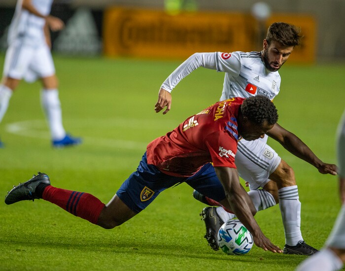 (Rick Egan  |  The Salt Lake Tribune). Real Salt Lake defender Nedum Onuoha (14) goes for the ball along with Los Angeles FC forward Diego Rossi (9), in MLS soccer action between Real Salt Lake and Los Angeles FC at Rio Tinto Stadium, on Wednesday, Sept. 9, 2020.


