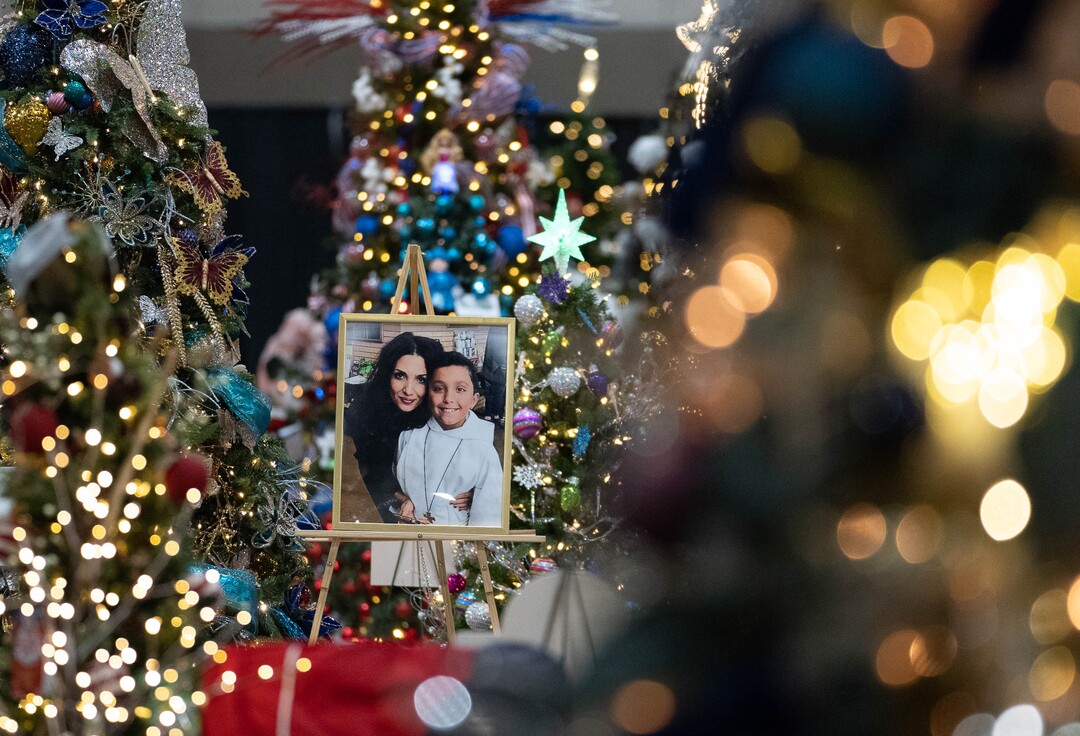 (Francisco Kjolseth | The Salt Lake Tribune) Trees honoring loves ones are displayed during the 51st annual Festival of Trees at the Mountain America Expo Center in Sandy on Tuesday, Nov. 30, 2021. The hundreds of elaborately decorated holiday trees and decorations that will be up for silent auction, with proceeds going to Intermountain Primary Children’s Hospital, will be virtual for the second year in a row due to the COVID-19 pandemic.