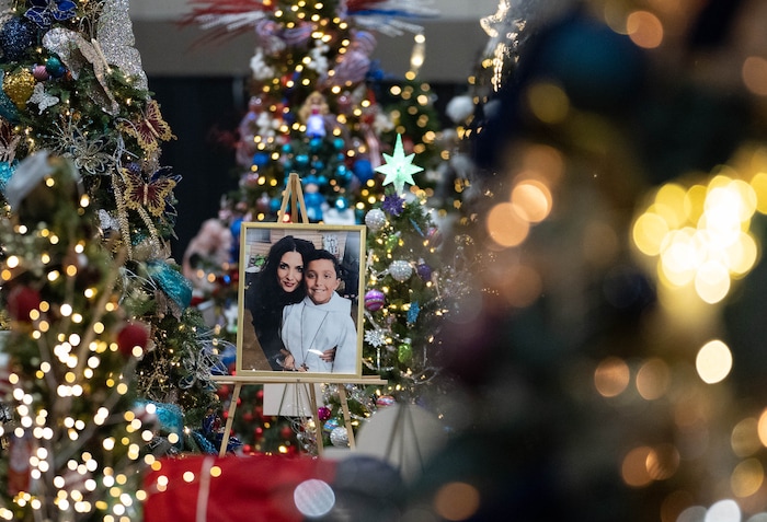 (Francisco Kjolseth | The Salt Lake Tribune) Trees honoring loves ones are displayed during the 51st annual Festival of Trees at the Mountain America Expo Center in Sandy on Tuesday, Nov. 30, 2021. The hundreds of elaborately decorated holiday trees and decorations that will be up for silent auction, with proceeds going to Intermountain Primary Children’s Hospital, will be virtual for the second year in a row due to the COVID-19 pandemic.