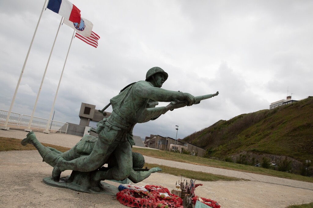 (Virginia Mayo | AP photo)

In this photo taken on Thursday, June 4, 2020, wreaths and flags sit in front of the Ever Forward memorial near Omaha Beach, in Vierville-sur-Mer, Normandy, France.