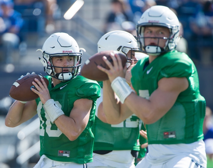 (Rick Egan  |  The Salt Lake Tribune)  Quarterback Koy Detmer Jr. (10) (left) and Beau Hoge (7) right,  throws the ball, during the BYU scrimmage at Lavell Edwards Stadium, Thursday, August 17, 2017.