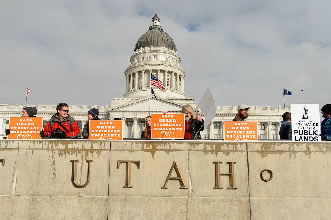 (Trent Nelson | The Salt Lake Tribune)  Protesters gather before a visit by President Donald Trump, Monday December 4, 2017.