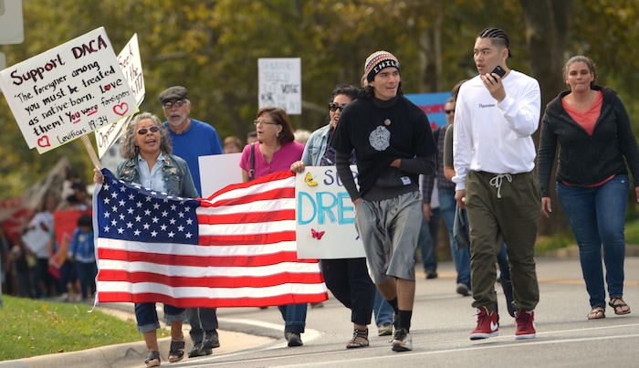 (Leah Hogsten  |  The Salt Lake Tribune) Hundreds of “We are Dreamers,” a Utah pro-Deferred Action for Childhood Arrival (DACA) group, marched in solidarity from the Utah Federal Building to the State Capitol with undocumented immigrants who will be affected by the end of DACA. 