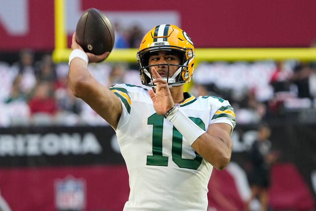 (Rick Scuteri | AP) Green Bay Packers quarterback Jordan Love (10) warms up prior to an NFL football game against the Arizona Cardinals, Thursday, Oct. 28, 2021, in Glendale, Ariz.