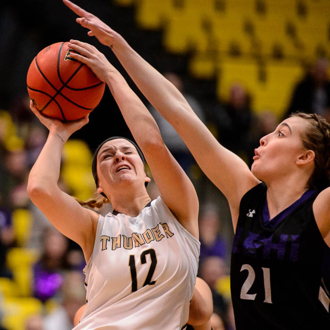 (Trent Nelson | The Salt Lake Tribune)  Lehi vs. Desert Hills, 4A State high school basketball tournament at Utah Valley University in Orem, Thursday March 1, 2018. Desert Hills's Elly Williams (12) shoots, defended by Lehi's Sarah Christopherson (21).