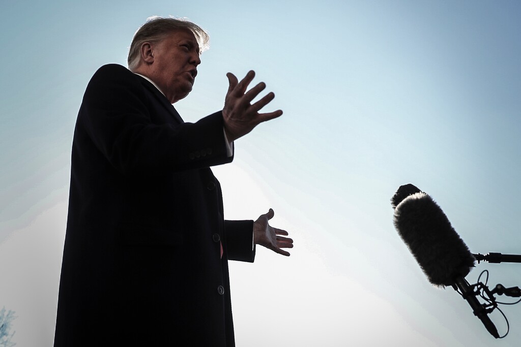 (Oliver Contreras | The New York Times)
President Donald Trump talks to reporters at the White House in Washington, Tuesday, Jan. 12, 2021, before boarding Marine One for a trip to Alamo, Texas, his first public appearance in nearly a week after his supporters violently attacked the U.S. Capitol in an effort to overturn election results. President Trump on Tuesday showed no contrition or regret for instigating the mob that stormed the Capitol and threatened the lives of members of Congress and his vice president, saying that his remarks to a rally beforehand were "totally appropriate" and that the effort by Congress to impeach and convict him was "causing tremendous anger."