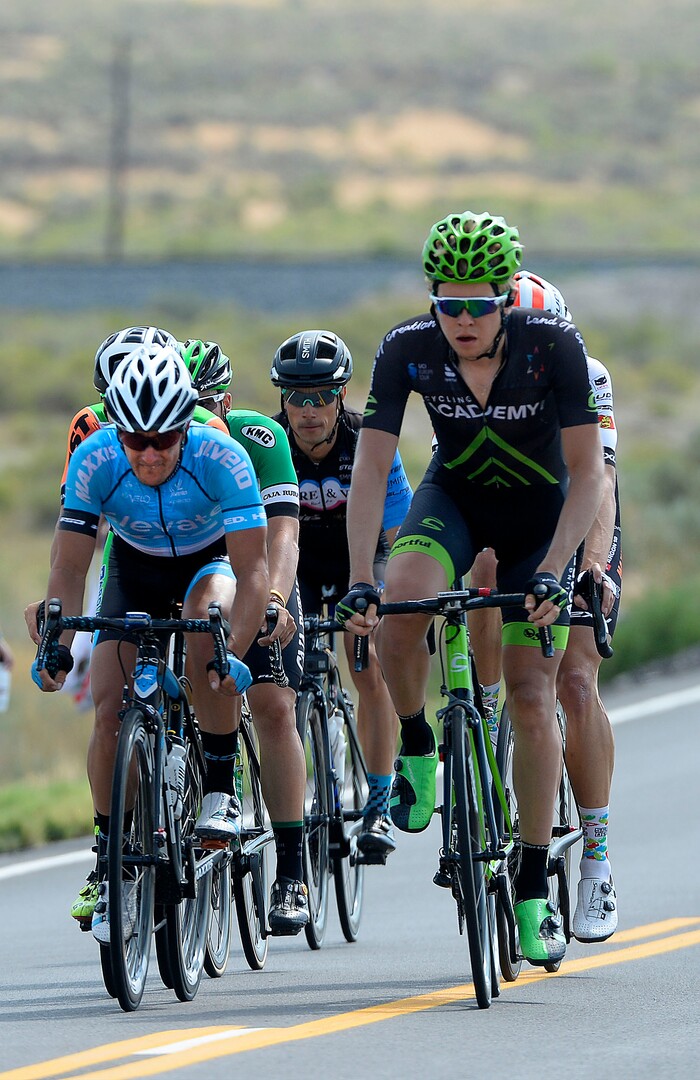 Al Hartmann | The Salt Lake Tribune
Frontrunners Brian McCulloch, left, and Daniel Turek lead frontrunners into the feed zone in Rush Valley the halfway point in the race. Stage 4 started in South Jordan went west into the hot, dry west desert and finished back in South Jordan 123 miles later.