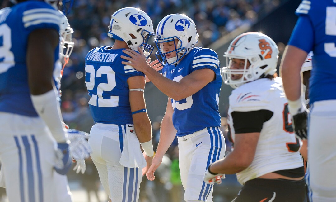 (Leah Hogsten  |  The Salt Lake Tribune) Brigham Young Cougars place kicker Jake Oldroyd (39) celebrates with  Hayden Livingston (22) after scoring the extra point as Brigham Young University takes on Idaho State, Saturday, Nov. 16, 2019 at LaVell Edwards Stadium.