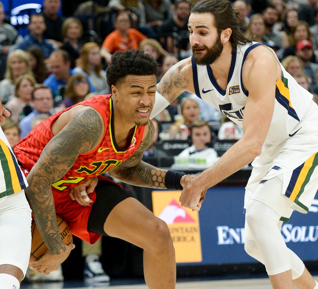 Leah Hogsten  |  The Salt Lake Tribune  Utah Jazz guard Ricky Rubio (3) tries to steal from Atlanta Hawks forward John Collins (20). The Utah Jazz defeated the Atlanta Hawks, 128-112  at Vivint Smart Home Arena, Feb. 1, 2019. 