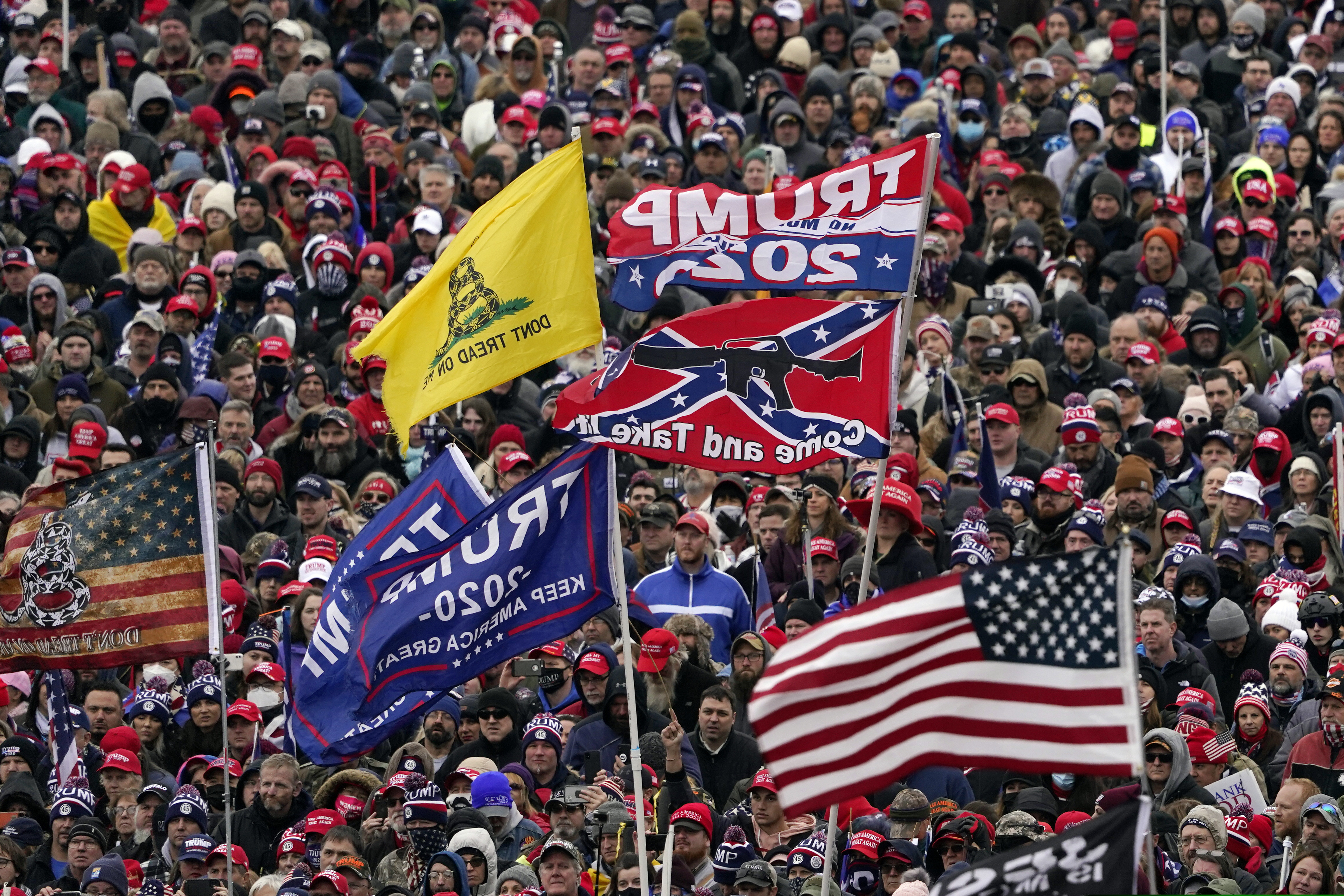 (AP Photo/Evan Vucci, File)

In this Jan. 6, 2021, photo, supporters listen as President Donald Trump speaks as a Confederate-themed and other flags flutter in the wind during a rally in Washington.