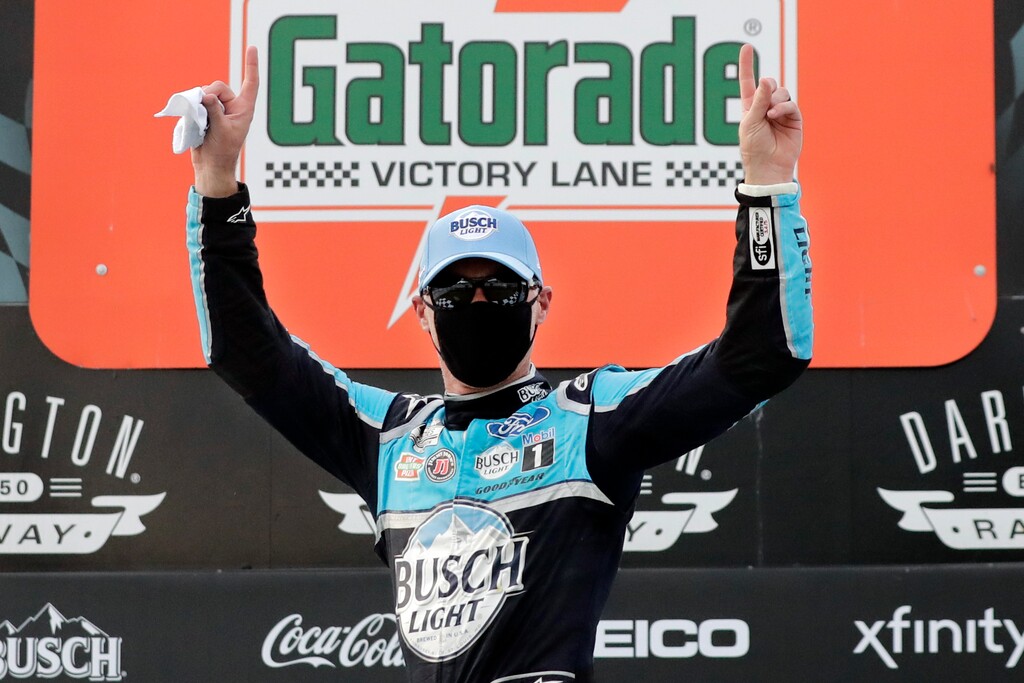 Kevin Harvick celebrates after winning the NASCAR Cup Series auto race Sunday, May 17, 2020, in Darlington, S.C. (AP Photo/Brynn Anderson)