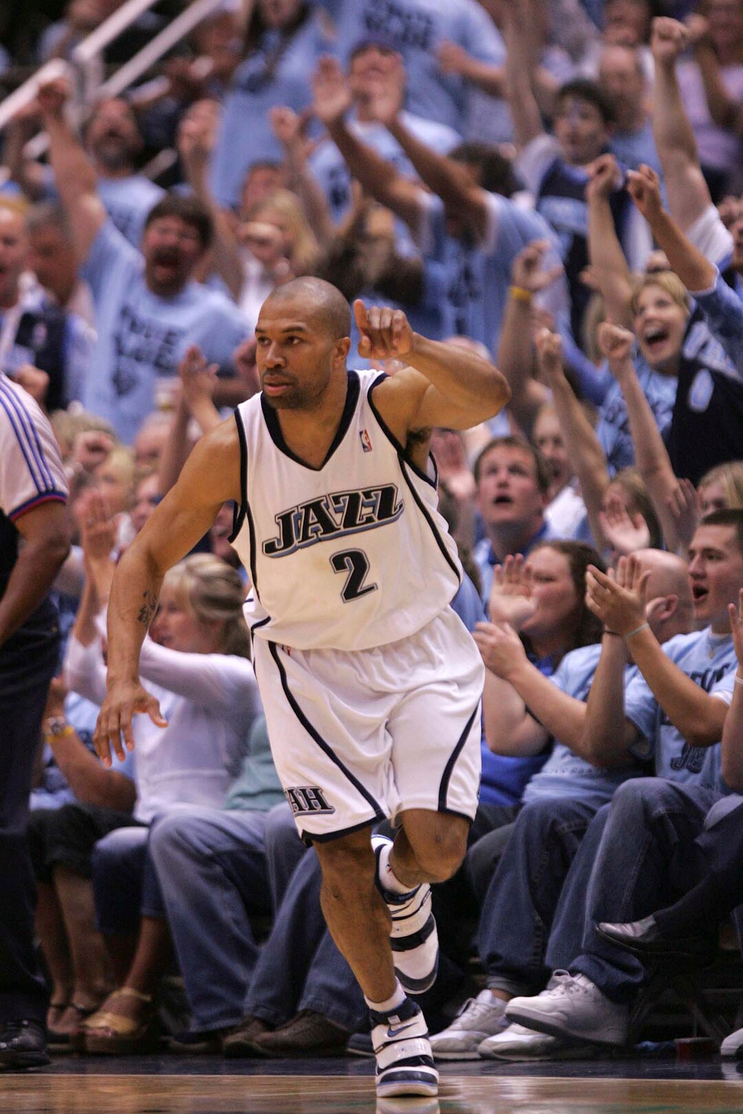 (Trent Nelson  |  Tribune file photo) Utah Jazz guard Derek Fisher (2) points to the Jazz bench after hitting a three-point shot to put Utah ahead 62-60 in the 3rd quarter of game three of the 2007 Western Conference Finals.