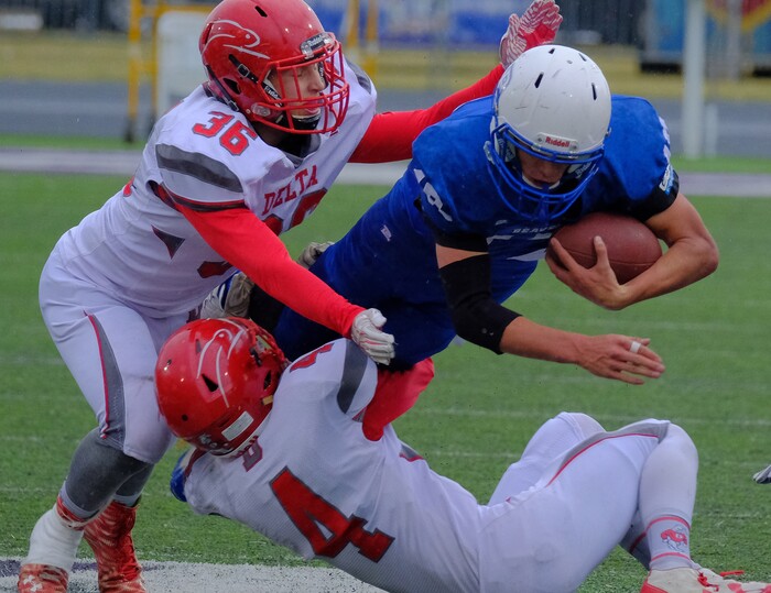 (Leah Hogsten  |  The Salt Lake Tribune) Beaver's quarterback Porter Hollingshead runs for a first down. Beaver High School boys' football team defeated Delta High School 35-16 during their class 2A state semifinal football game Saturday, November 4, 2017 at Weber State University's Stewart Stadium.