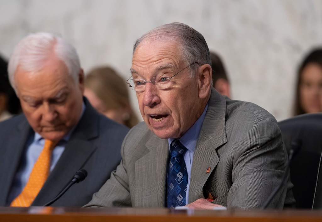 Senate Judiciary Committee Chairman Chuck Grassley, R-Iowa, joined by Sen. Orrin Hatch, R-Utah, left, opens a hearing on the Trump administration's policies on immigration enforcement and family reunification efforts, on Capitol Hill in Washington, Tuesday, July 31, 2018.  (AP Photo/J. Scott Applewhite)