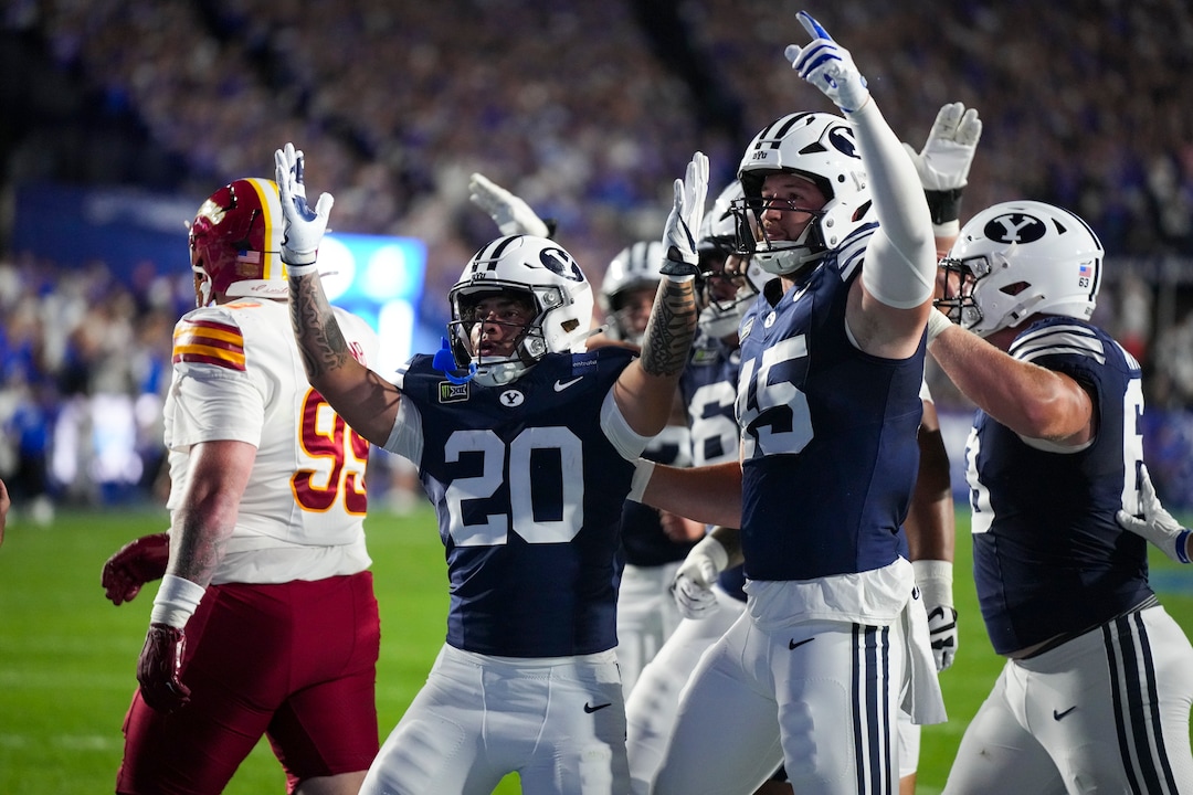 (Bethany Baker  |  The Salt Lake Tribune) BYU Cougars celebrate a touchdown by BYU Cougars running back Journee Tonga (20) during the game between the BYU Cougars and the Iowa State Cyclones in Provo on Friday, Oct. 9, 2026.