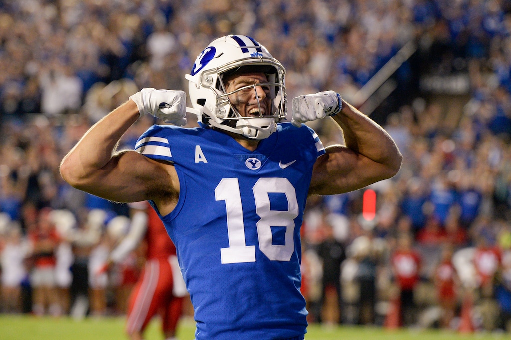 (Chris Samuels | The Salt Lake Tribune) Brigham Young Cougars wide receiver Gunner Romney celebrates after scoring a touchdown as the Cougars play the Utah Utes in football, Saturday, Sept. 11, 2021 in Provo. He announced on Instagram that he will return to the team in 2022.