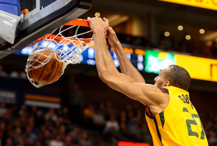(Steve Griffin  |  The Salt Lake Tribune)  Utah Jazz center Rudy Gobert (27) throws down a dunk during the Utah Jazz versus Detroit Pistons at Vivint Smart Home Arena in Salt Lake City Tuesday March 13, 2018.